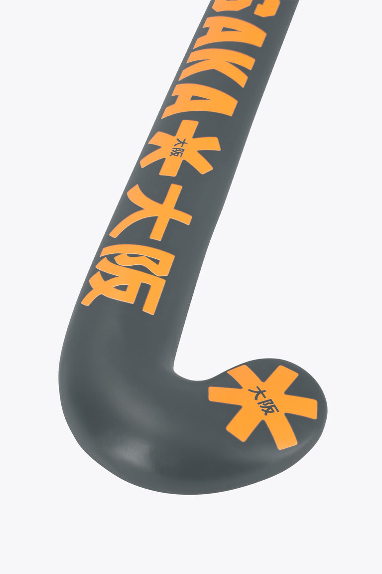 Field hockey stick curved blade, dark gray with large orange logo graphic