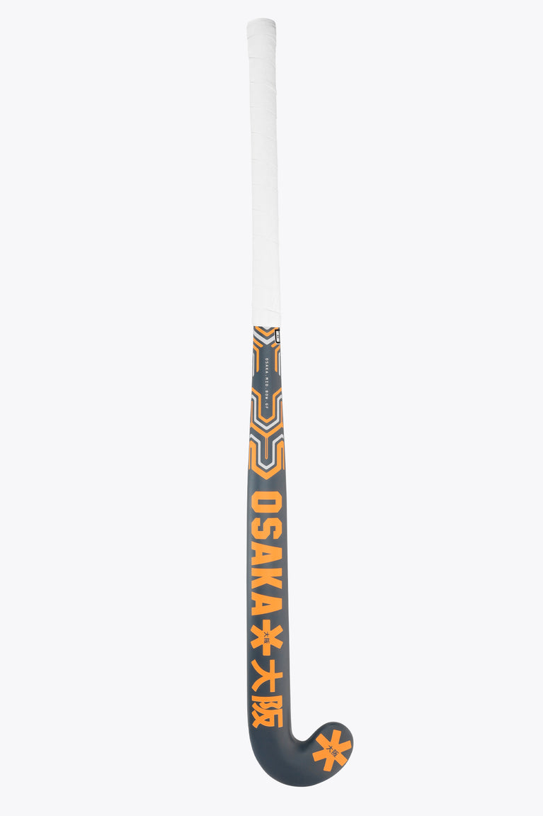 Field hockey stick shaft with white grip, orange and gray patterned section