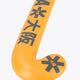 Orange field hockey stick head with black geometric markings and Osaka text