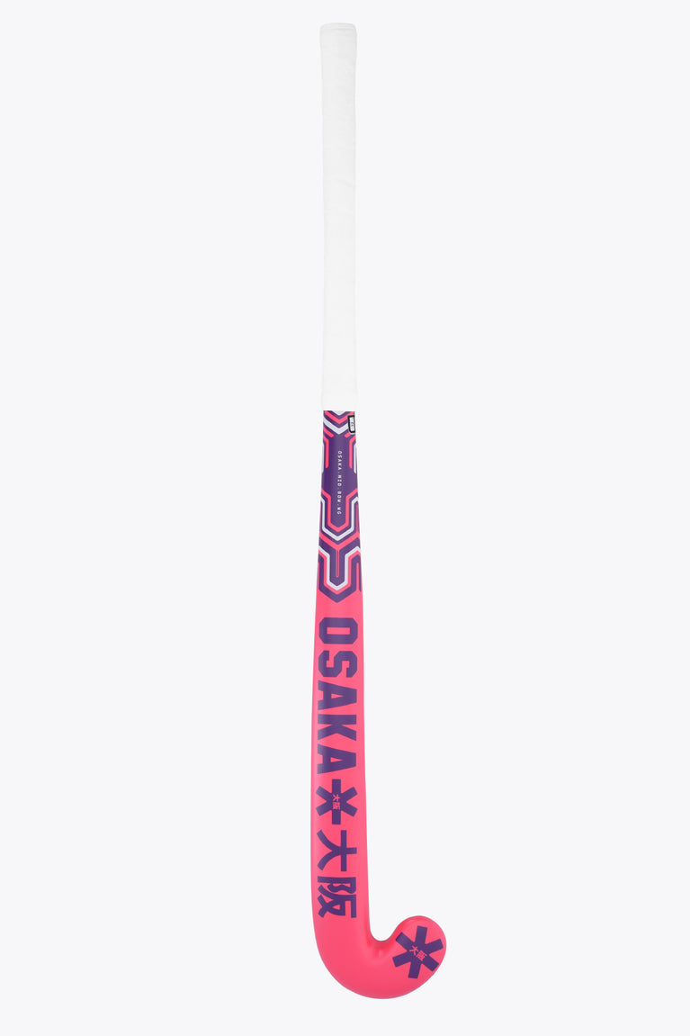 Hot pink Osaka field hockey stick handle with dark star logo on shaft