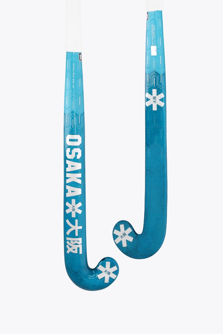 Blue field hockey stick with mid-bow curve and white snowflake-style logos