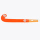 Orange field hockey stick with long shaft and patterned graphics along the blade