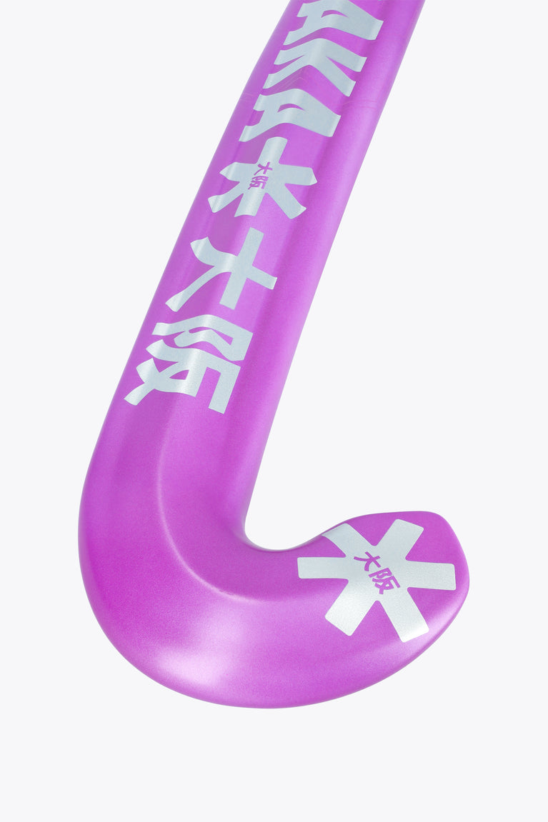 Close-up of purple field hockey stick blade with printed Rose Bud graphics