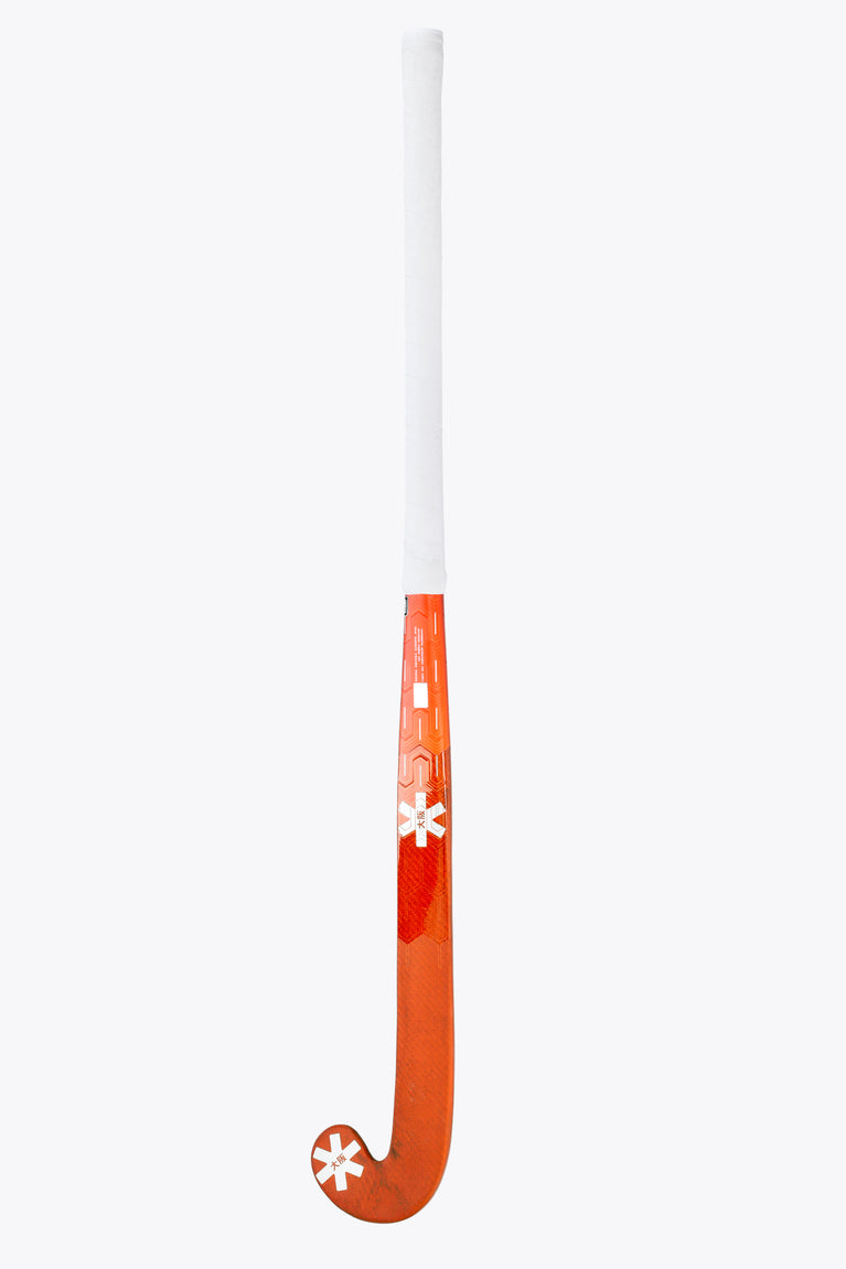 Bright orange field hockey stick curved end with white shaft