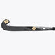 Field hockey stick with dark curved blade and gold X-style logo on shaft