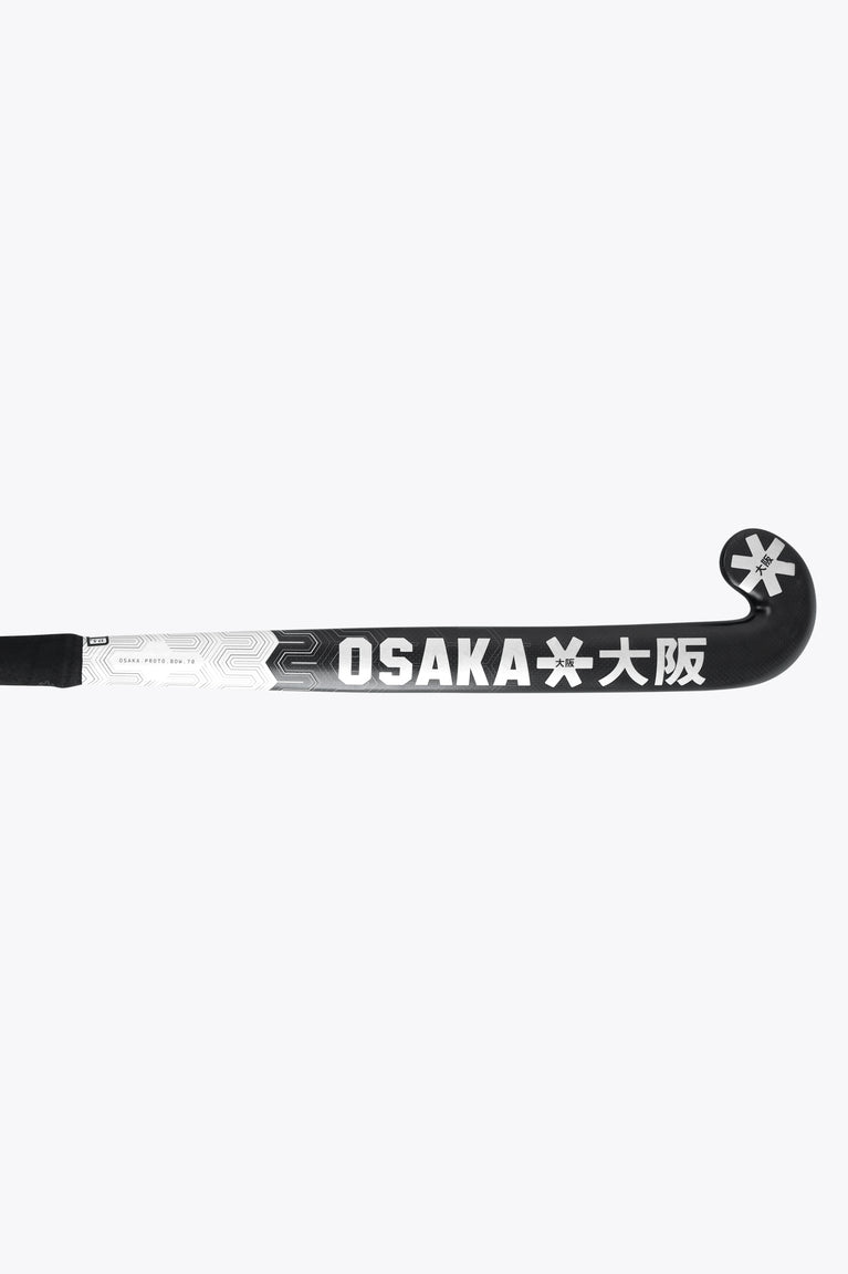 Field hockey stick shaft end with Osaka branding and star icon