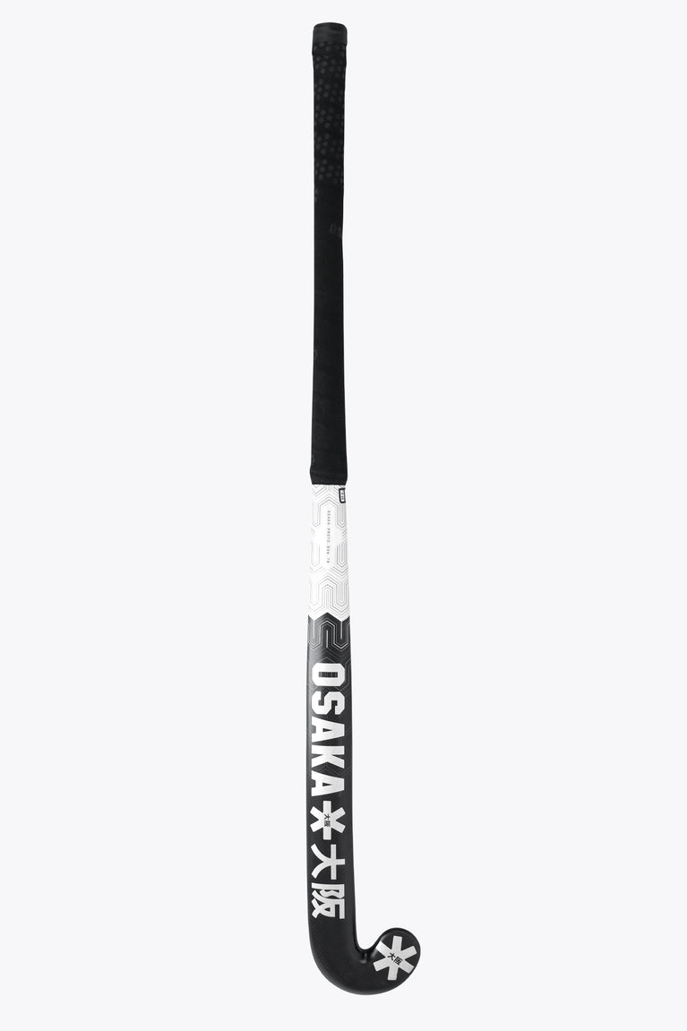 Field hockey stick with white shaft panel, black neck, and star logo