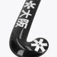 Curved dark field hockey blade with large printed characters and star logo