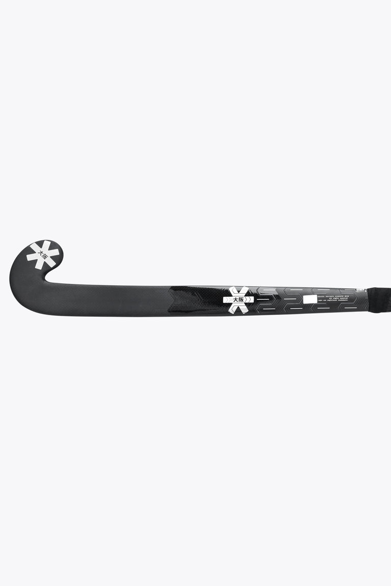 Full dark field hockey stick showing curved blade shape and star logo near the head