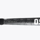 Dark field hockey stick shaft with geometric graphics and a visible “85” marking