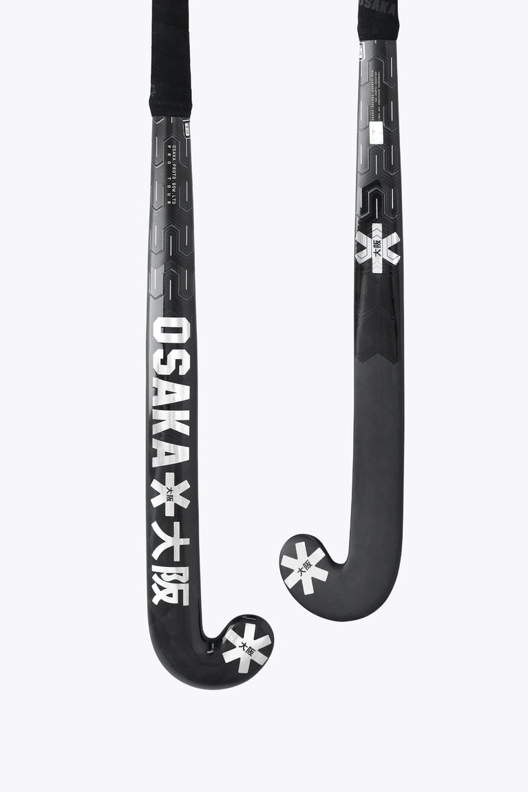 Field hockey stick head view, black blade with star marks and Osaka logo on shaft