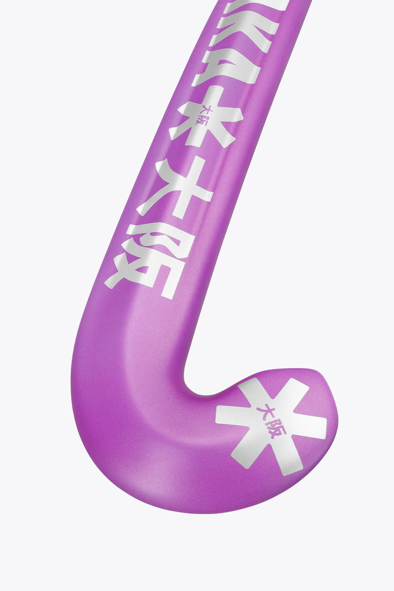 Rose bud low-bow field hockey stick head with curved profile and star accents.