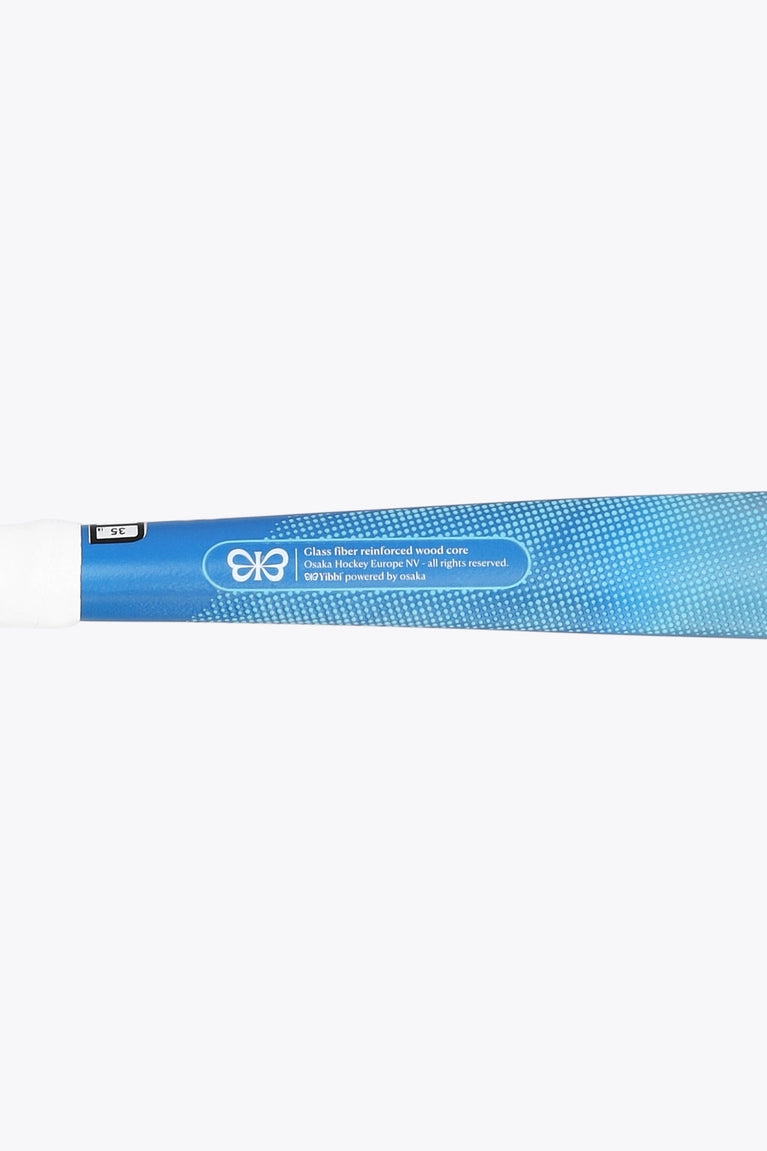 Blue mid-bow field hockey stick shaft with white label strip near handle.