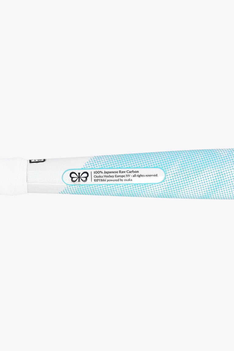 White field hockey stick grip with 100% Japanese raw carbon label on shaft
