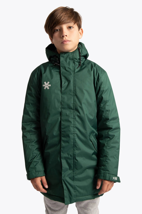 Osaka Kids Stadium Jacket | Dark Green Boy wearing the Osaka Kids Stadium Jacket in Dark Green. Front view