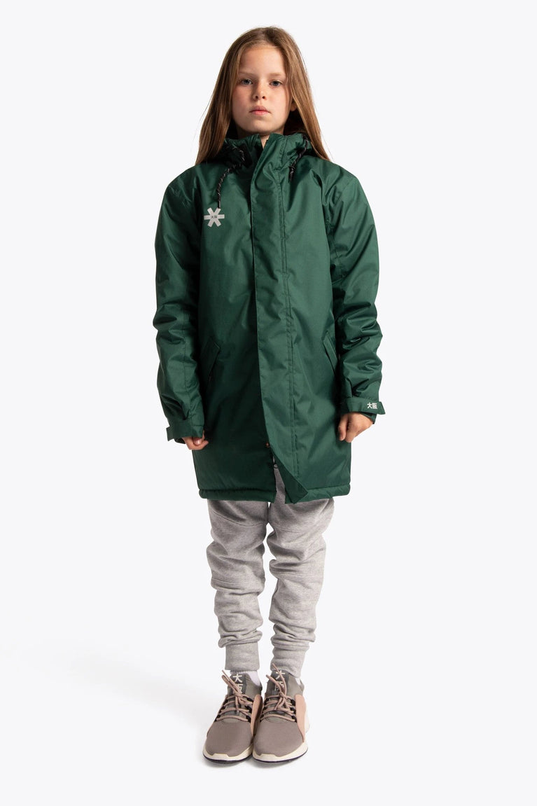 Girl wearing the Osaka Kids Stadium Jacket in Dark Green. Front view