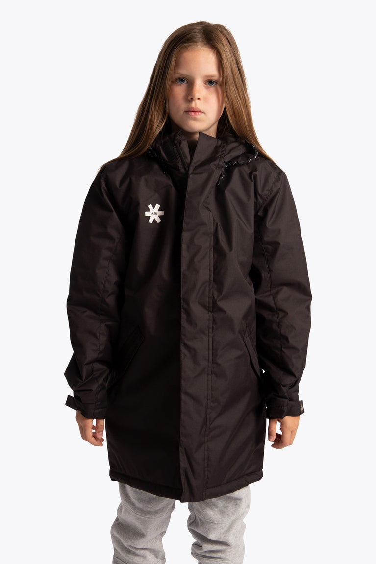 Girl wearing the Osaka Kids Stadium Jacket in Black. Front view