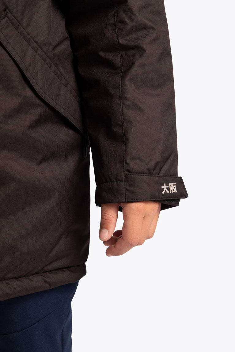 Osaka Kids Stadium Jacket in Black. Detail logo sleeve view