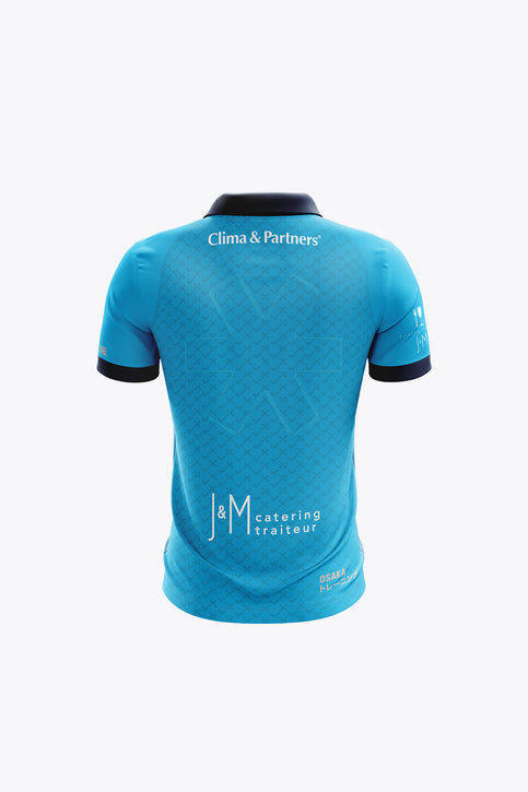 Braxgata Kids Polo Jersey - Blue Kids polo jersey in teal/blue with dark navy collar and button placket, logo chest print