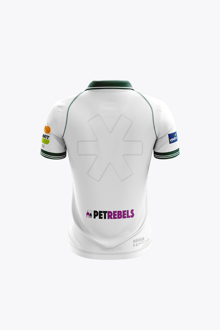 De Hopbel kids polo jersey in white with green collar and sleeve stripes; back graphic print.
