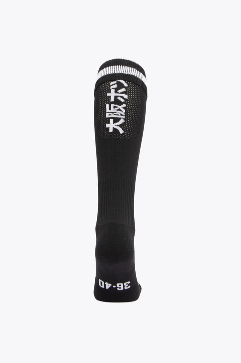 HC Zwart Wit Field Hockey Socks - Black HC Zwart Wit Field Hockey Socks with Osaka logo in green. Front view