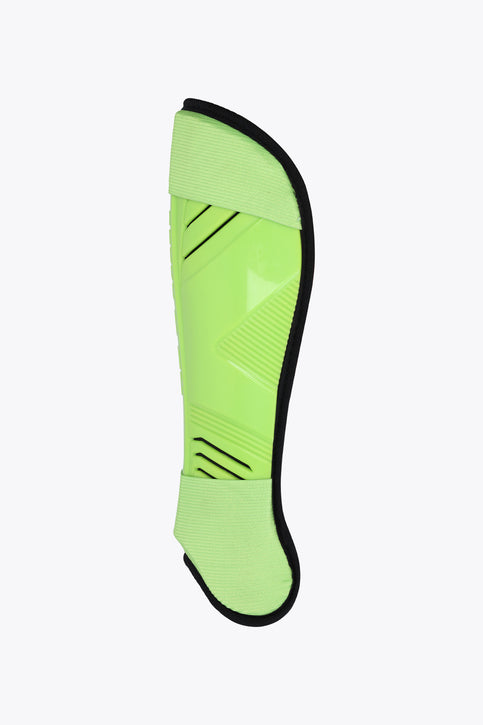 Osaka Hockey Shinguard | Wild Lime Osaka hockey shin guard in wild lime with black bottom and ankle strap