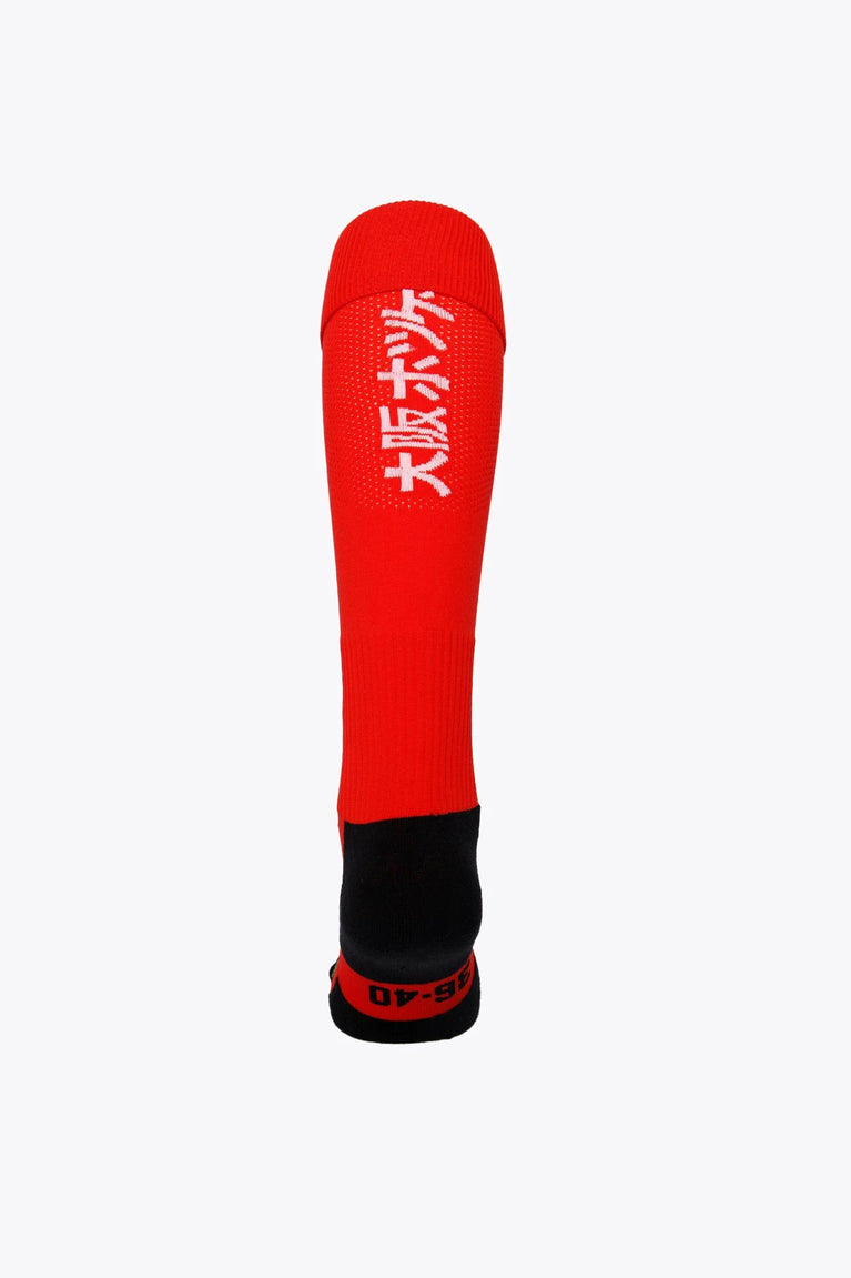 CD Terrassa Field Hockey Socks in red with Osaka logo in green. Back view