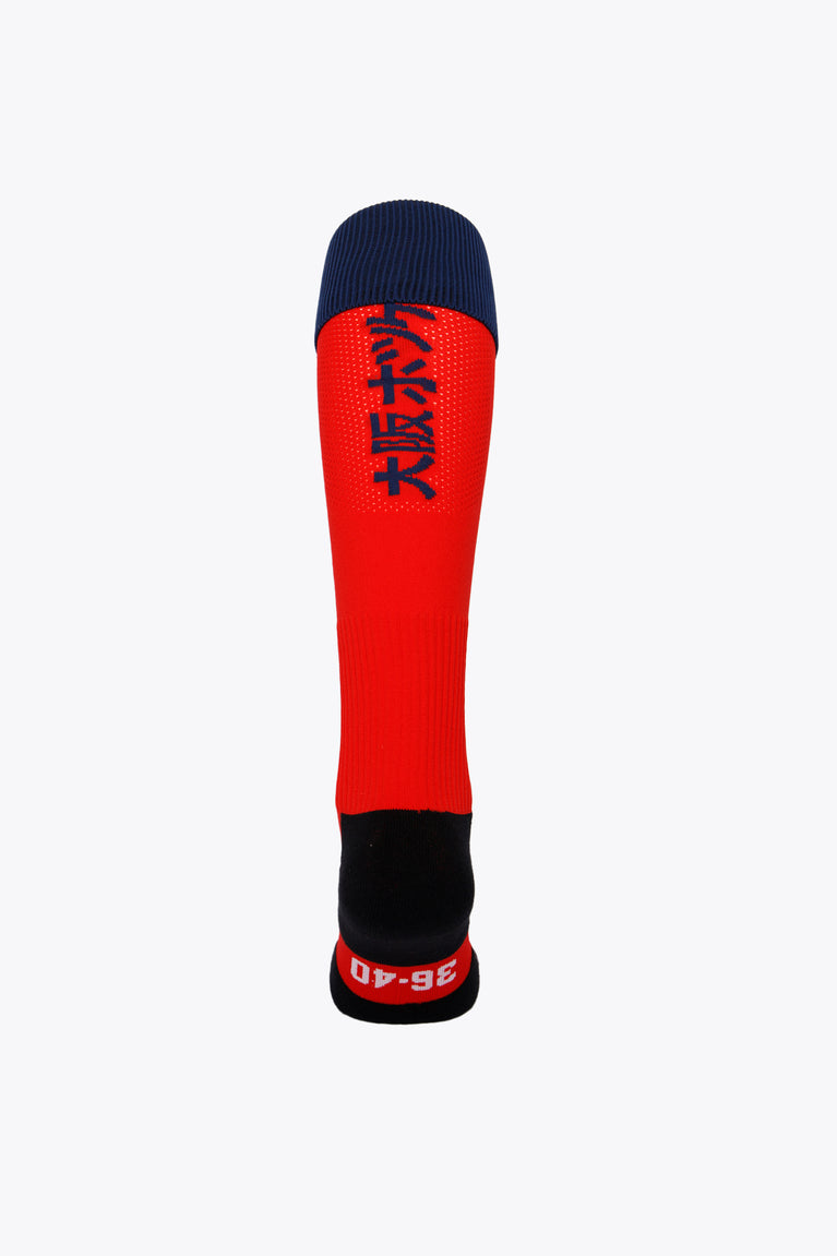 Stade Français Field Hockey Socks in red with Osaka logo in green. Back view