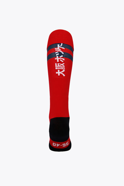 Indiana Field Hockey Socks - Red Indiana Field Hockey Socks in red with Osaka logo in green. Front view