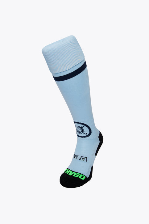 HC Keerbergen Field Hockey Socks - Sky Blue HC Keerbergen Field Hockey Socks in sky blue with Osaka logo in green. Front view
