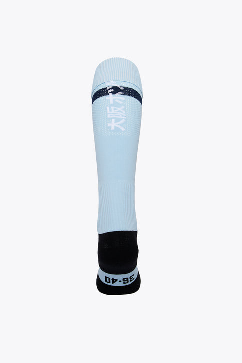 HC Keerbergen Field Hockey Socks - Sky Blue HC Keerbergen Field Hockey Socks in sky blue with Osaka logo in green. Front view