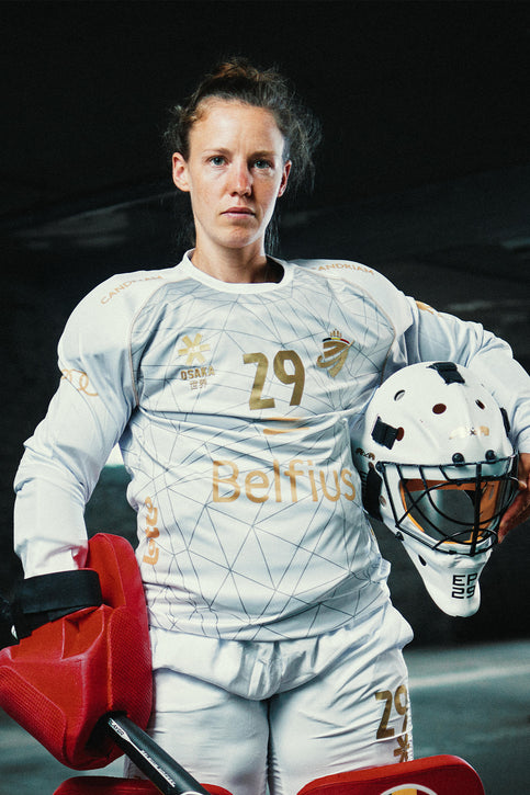 White long-sleeve goalkeeper jersey with geometric pattern and Belfius front graphic