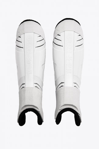 Accessories Osaka Shinguard white and black with logo. Front view