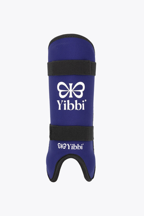 Yibbi kids’ shin guards, deep sea navy with black straps and front logo.