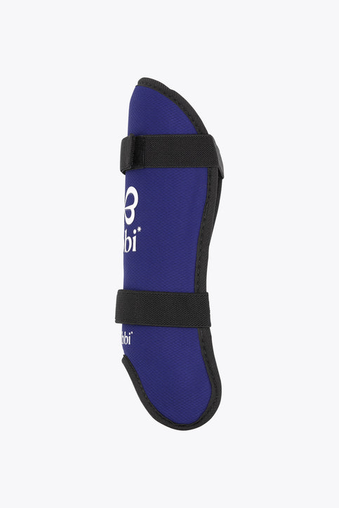 Yibbi kids’ shin guards, deep sea navy with black straps and front logo.