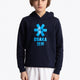 Boy wearing the Osaka kids hoodie in navy with blue star logo. Front view