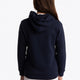 Girl wearing the Osaka kids hoodie in navy with blue star logo. Back view