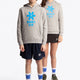 Boy and girl wearing the Osaka kids hoodie in grey with blue star logo. Front full view