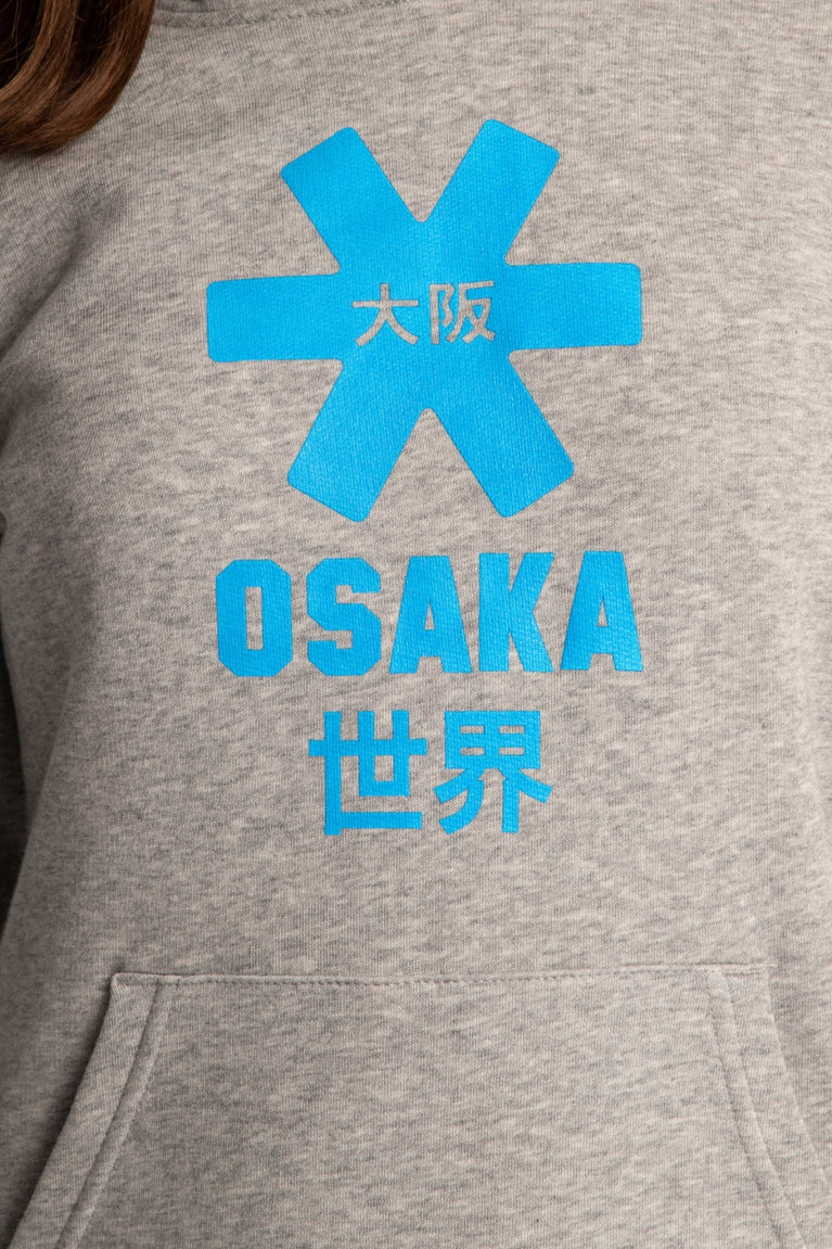 Osaka kids hoodie in grey with blue star logo. Detail logo view