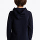 Boy wearing the Osaka kids hoodie in navy with green star logo. Back view