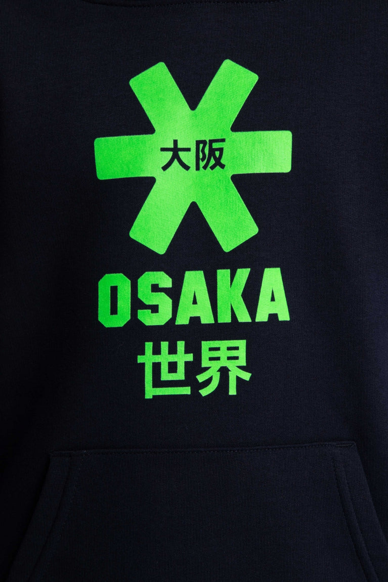 Osaka kids hoodie in navy with green star logo. Detail view logo
