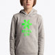 Boy wearing the Osaka kids hoodie in grey with green star logo. Front view