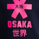 Osaka kids hoodie in navy with pink star logo. Detail view logo