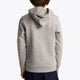 Boy wearing the Osaka kids hoodie in grey with pink star logo. Back view