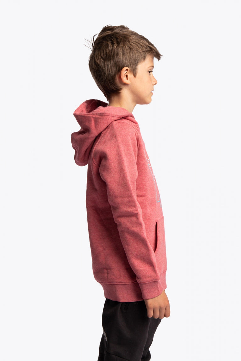 Boy wearing the Osaka kids trace hoodie in cranberry with logo in white and blue. Side view