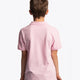 Boy wearing the Osaka kids polo in cotton pink with logo in white. Back view