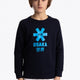 Boy wearing the Osaka kids sweater in navy with logo in blue. Front view