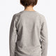 Boy wearing the Osaka kids sweater in grey with logo in blue. Back view