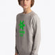 Boy wearing the Osaka kids sweater in grey with logo in green. Front/side view