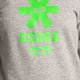 Osaka kids sweater in grey with logo in green. Detail view logo